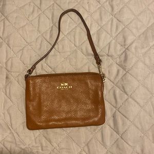 Coach wristlet in brown! 2 credit card slots inside wristlet! In very good shape